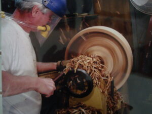 Jim turning bowl at the lathe